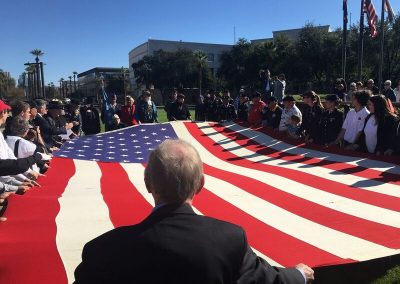 Dave Giles helping Fold USS Arizona Flag